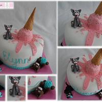 A cake with cats en ice cream