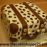 leopard suitcase cake