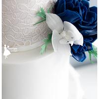 Navy blue roses with puren white orchids