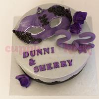 Masquerade birthday cake with mini cupcakes