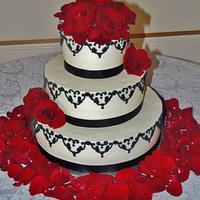 Dramatic Buttercream wedding cake in black and red!