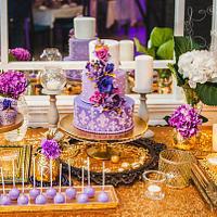 Purple & Gold wedding cake and dessert table!