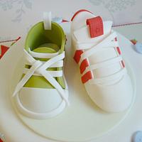 Baby shoe & football boot christening cake