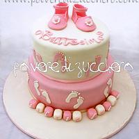 Christening cake with baby girl shoes