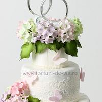 Wedding cake with hydrangeas and lace
