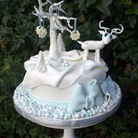 Blue and white reindeer cake
