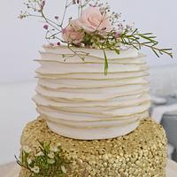 Gold edged ruffle and sequin wedding cake