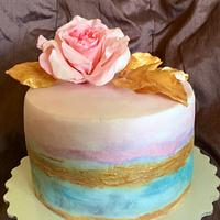 The birthday cake - gold and rose.