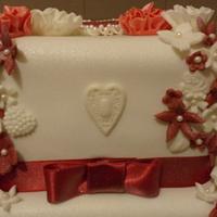 FLOWERY RED WEDDING CAKE