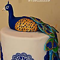 Peacock theme wedding cake
