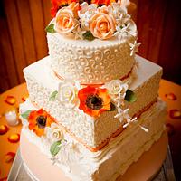 Orange and peach wedding cake