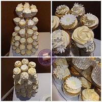 Daisy wedding cake and cupcakes