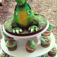 3d Cartoon T rex cake and cupcakes