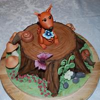 Tree tunk cake with squirrel