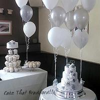 silver and white wedding cake