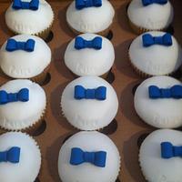 Prom style cupcakes suits and tie.