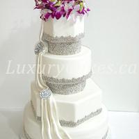 Edible silver beads embedded wedding cake