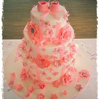 double sided baby girl christening cake with fantasy flowers and booties