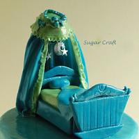 Blue cradle baptism cake