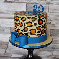 Leopard Print cake with a Blue Bow