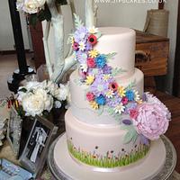 Meadow flowers and peonies wedding cake