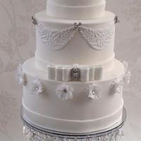 White peony cake on raindrop crystal stand 