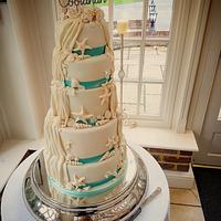 Diving themed reveal wedding cake