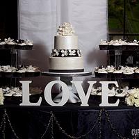 Dogwood wedding cake and cupcakes