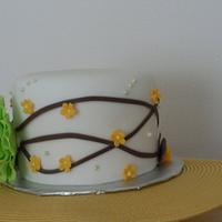 Green, brown, and yellow wedding cake sample