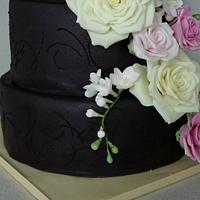Black  cake with roses