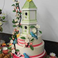 Spring themed bird house birthday cake