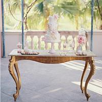Romantic wedding cake and dessert table