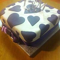 Cadbury's purple themed wedding cake & cupcakes