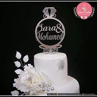 white and silver wedding cake 