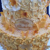 Yellow ombré cake with edible butterflies 