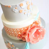 Peach and Grey Polkadot Wedding Cake with Wafer Paper Flowers