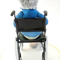 Woman in wheelchair cake topper