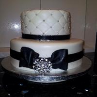 Black and white diamanté bow cake
