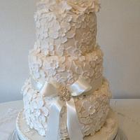 Three tier textured lace wedding cake 