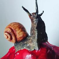 Snail on mushroom cake 