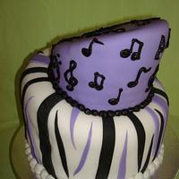 Musical topsy turvy cake