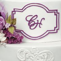 Wedding cake in white and purple colors.