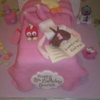 Girl on a bed cake