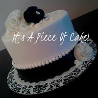 Black and White 6" Double Layer, Buttercream Iced, Fondant Accents