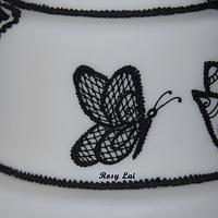 Black royal icing embroidery