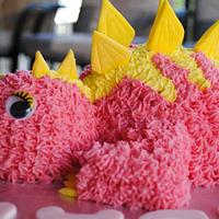 Baby stegosaurus cake