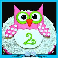 Pink owl giant cupcake cake