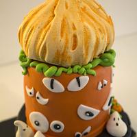 halloween cake with meringue pumpkin topper