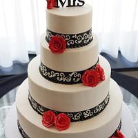 Ivory, red, and black wedding cake