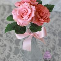Vase of sugar roses